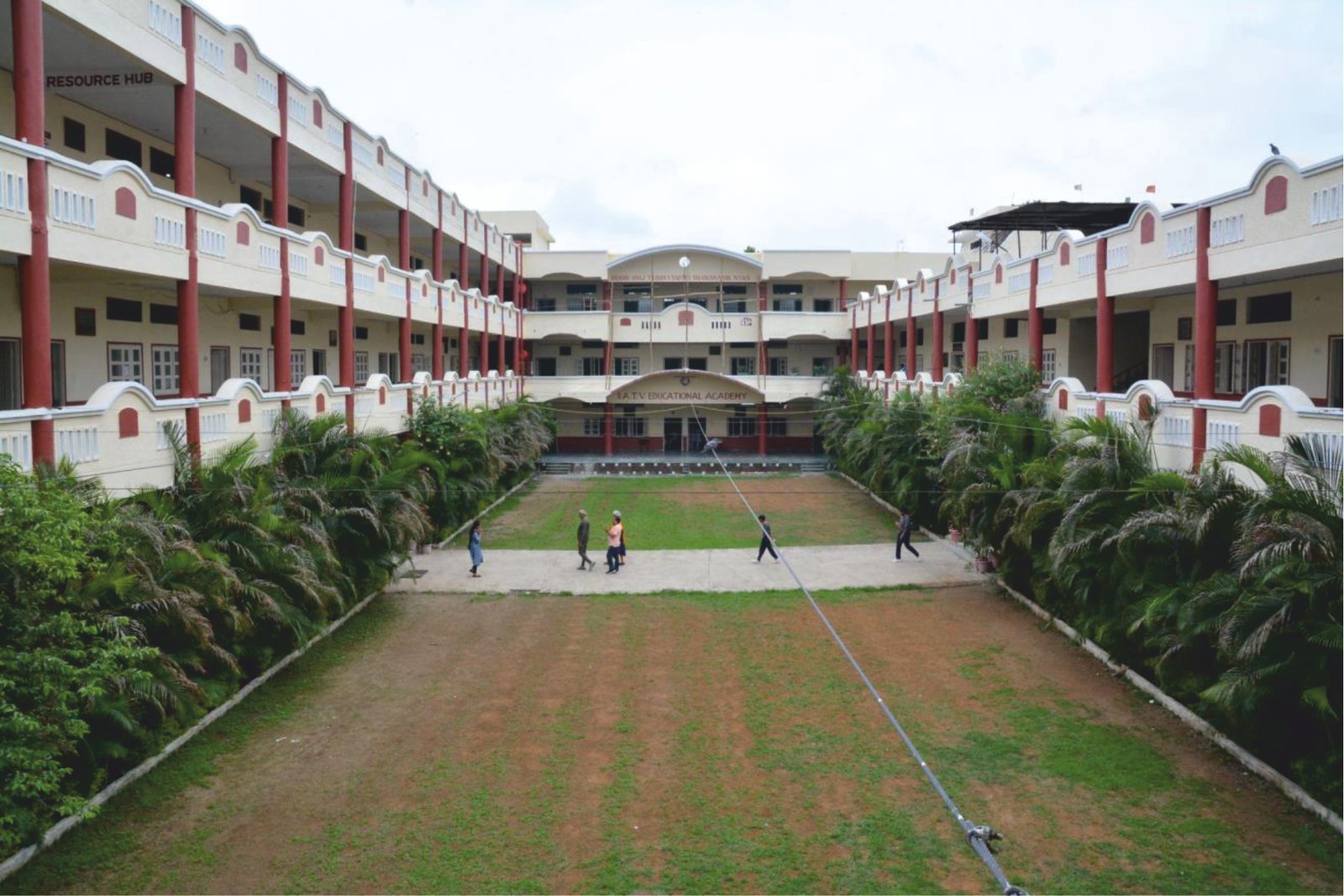 Safe and welcoming modern school campus courtyard with lush trees